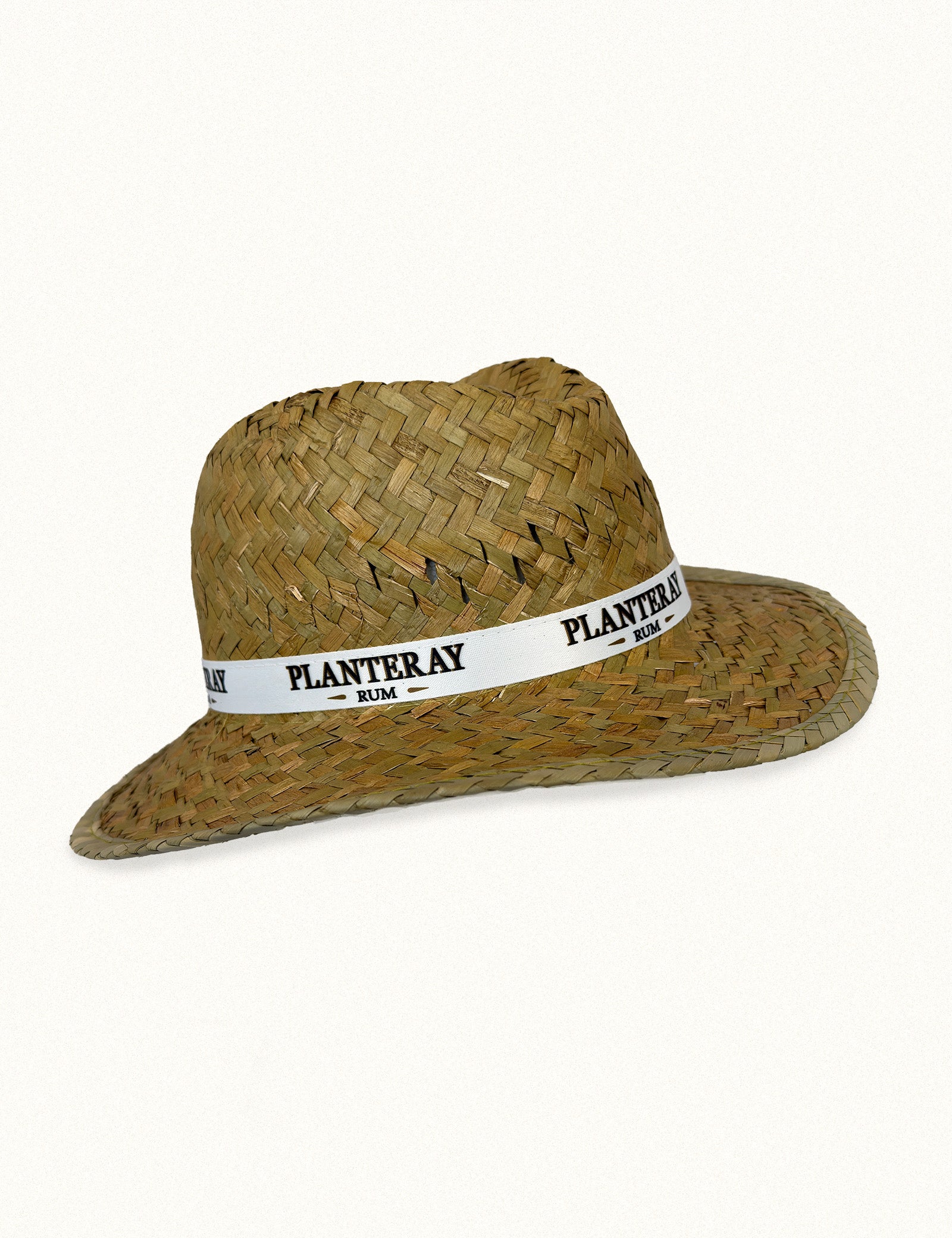 Strå hatt med logo Planteray Rum på ett band runt hatten avbildad från sidan